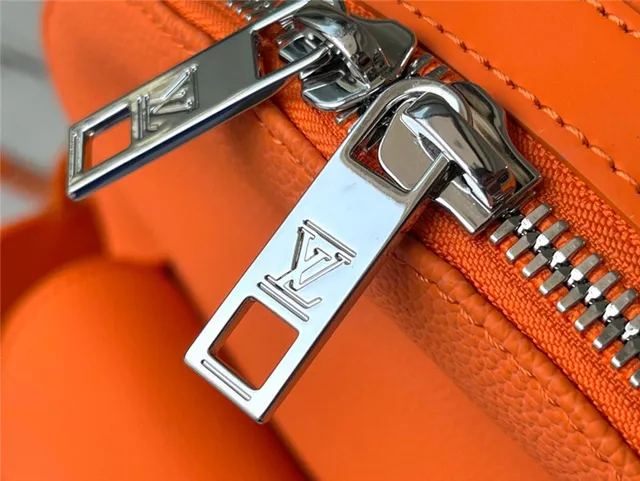 Louis Vuitton Orange Silver Structured Leather Embossed LV Monogram Casual Backpack 13