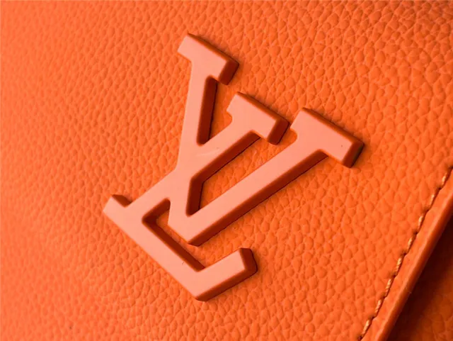 Louis Vuitton Orange Silver Structured Leather Embossed LV Monogram Casual Backpack 15