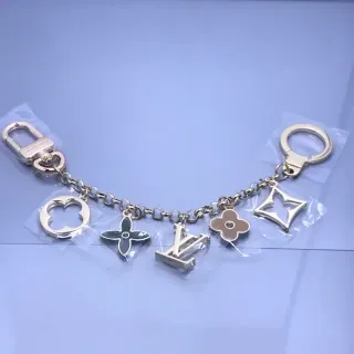 Louis Vuitton Silver Green Multi-Charm Metal Chain Bracelet