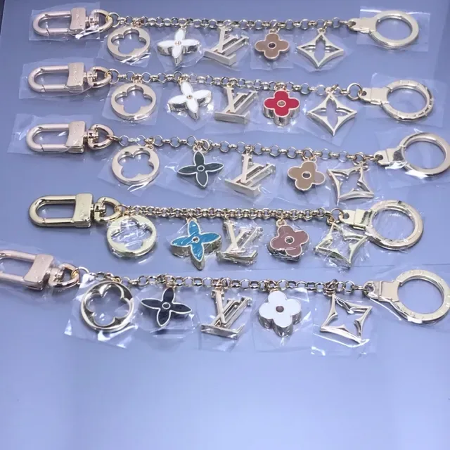 Louis Vuitton Silver Green Multi-Charm Metal Chain Bracelet 2