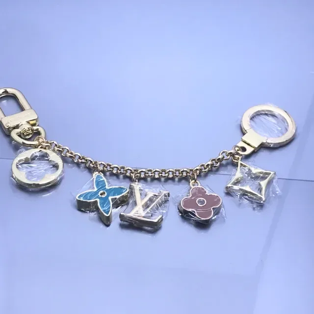 Louis Vuitton Silver Green Multi-Charm Metal Chain Bracelet 4