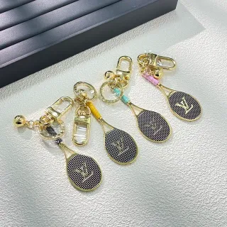 Louis Vuitton টেনিস র‍্যাকেট কীচেইন কালো সোনা মোনোগ্রামড ব্রেসলেট