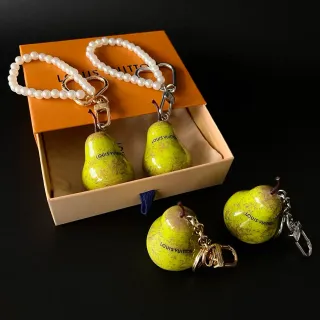 Louis Vuitton Yellow White Pear-Shaped Ceramic Charm Pearl-Loop Closure Bracelet