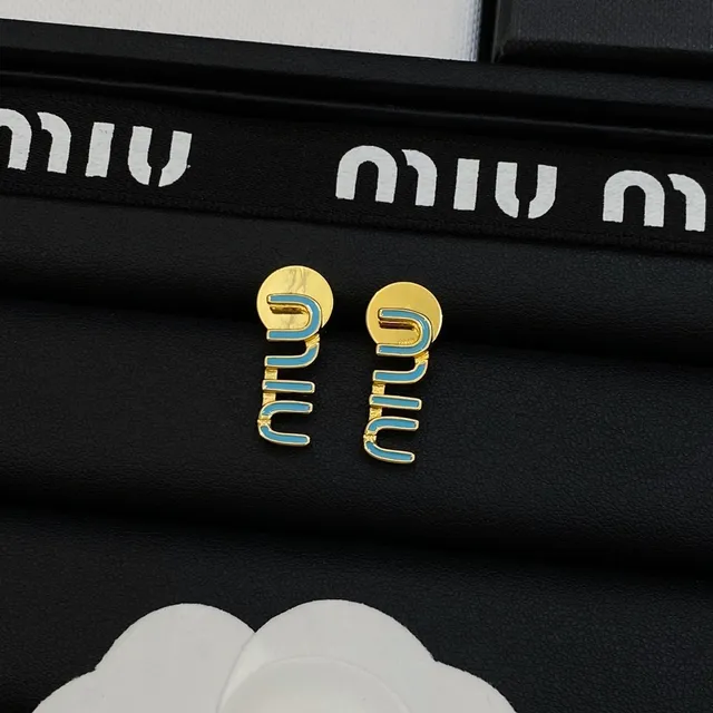 Miu Miu Boucles d'oreilles avec motif logo en émail bleu doré 4