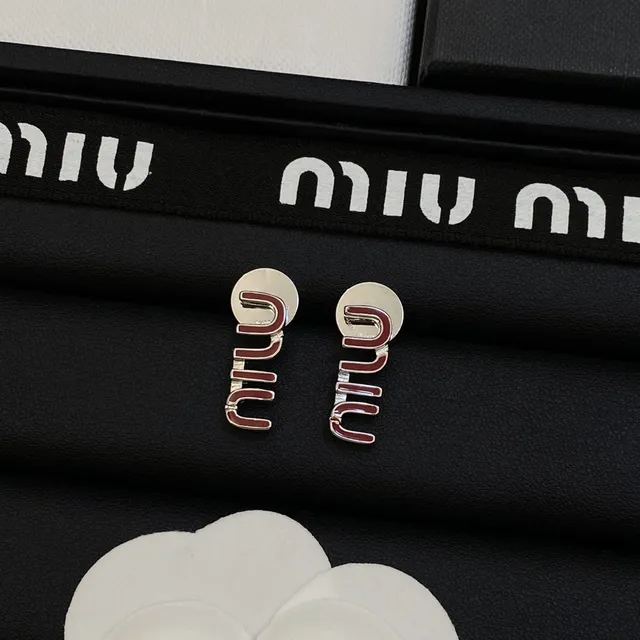 Miu Miu Boucles d'oreilles avec motif logo en émail bleu doré 6