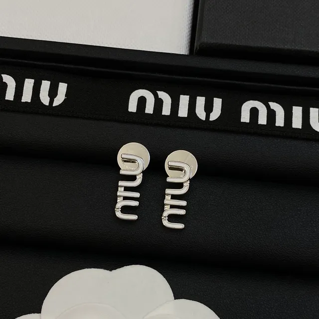 Miu Miu Boucles d'oreilles avec motif logo en émail bleu doré 7
