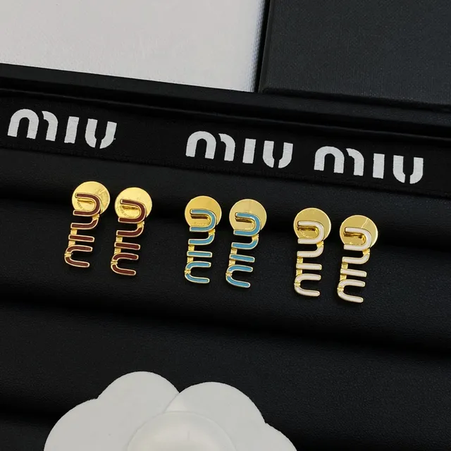 Miu Miu Boucles d'oreilles avec motif logo en émail bleu doré 9