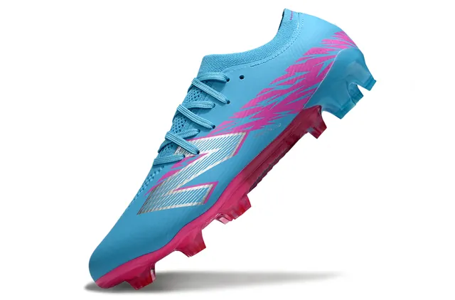New Balance Speed Ctrl Stu أزرق فاتح وردي أحذية كرة القدم للأرض الصلبة 3