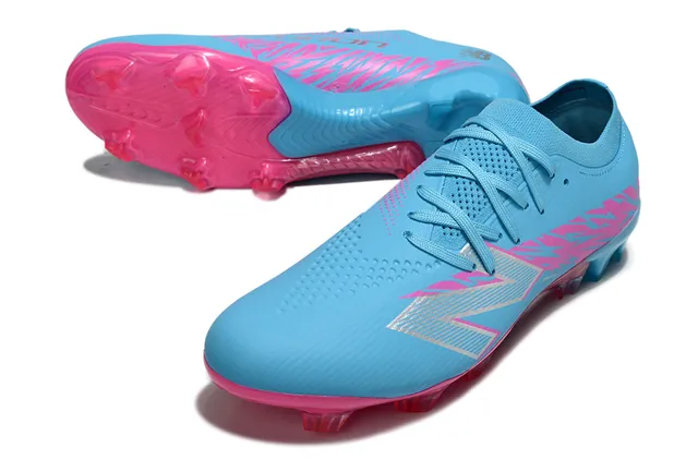New Balance Speed Ctrl Stu أزرق فاتح وردي أحذية كرة القدم للأرض الصلبة 4
