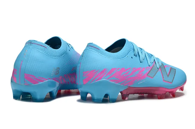 New Balance Speed Ctrl Stu أزرق فاتح وردي أحذية كرة القدم للأرض الصلبة 5