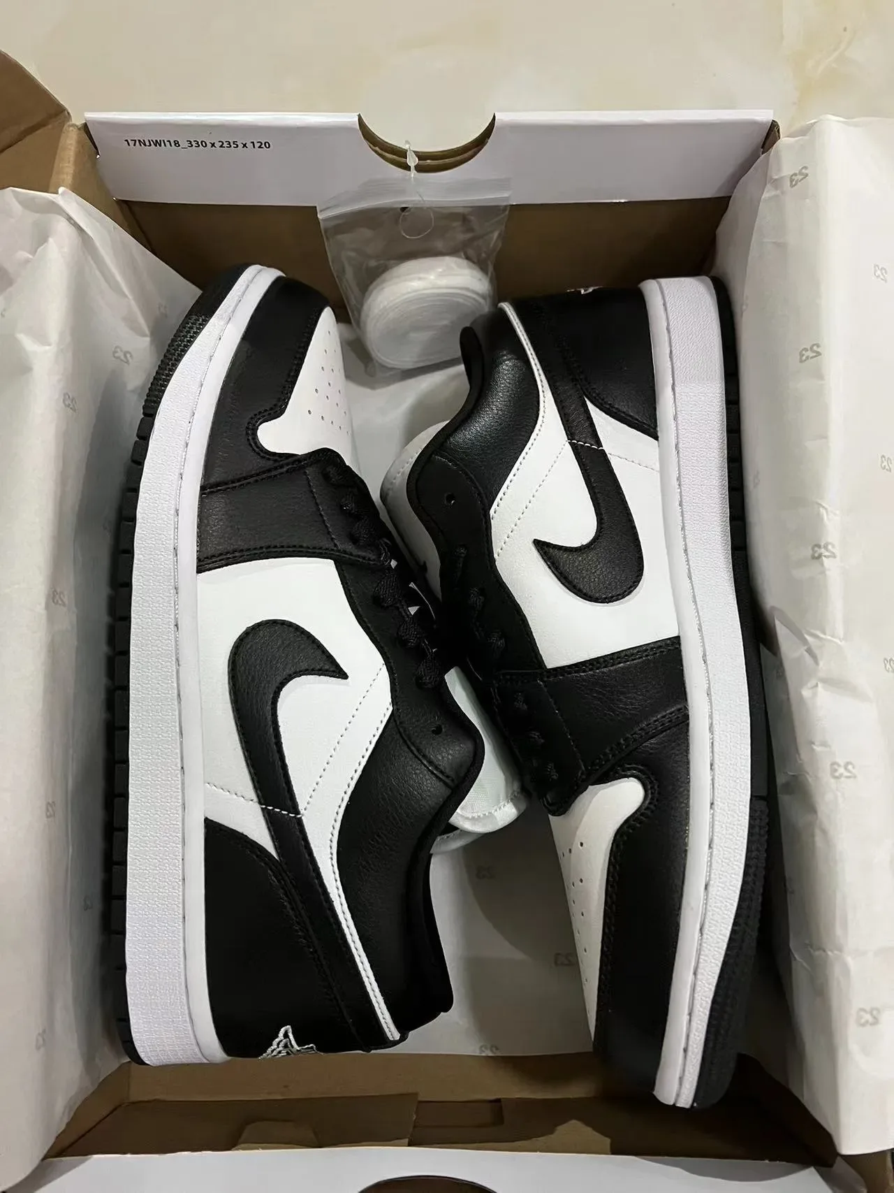 Nike Air Jordan 1 Low Black and White Lifestyle Sneakers 9