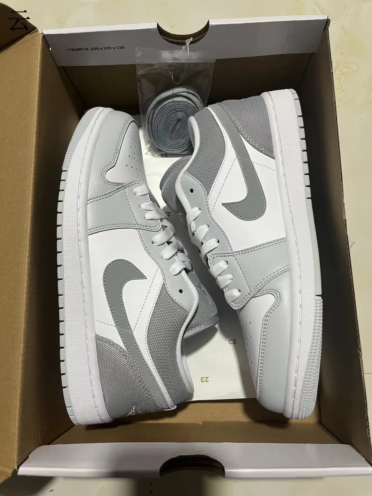 Nike Air Jordan 1 Low White and Gray Lifestyle Sneakers 11