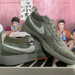 Nike Air Mowabb ऑलिव ग्रीन मेश और बनावट ओवरले लाइफस्टाइल स्नीकर