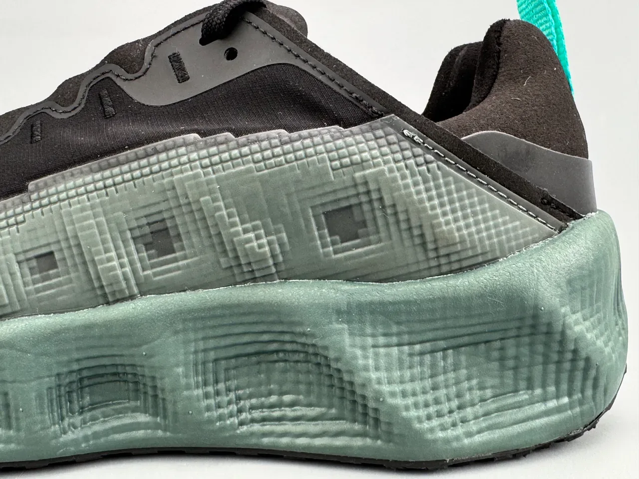 Nike Black and Teal Pixel Midsole Lifestyle Sneaker 5