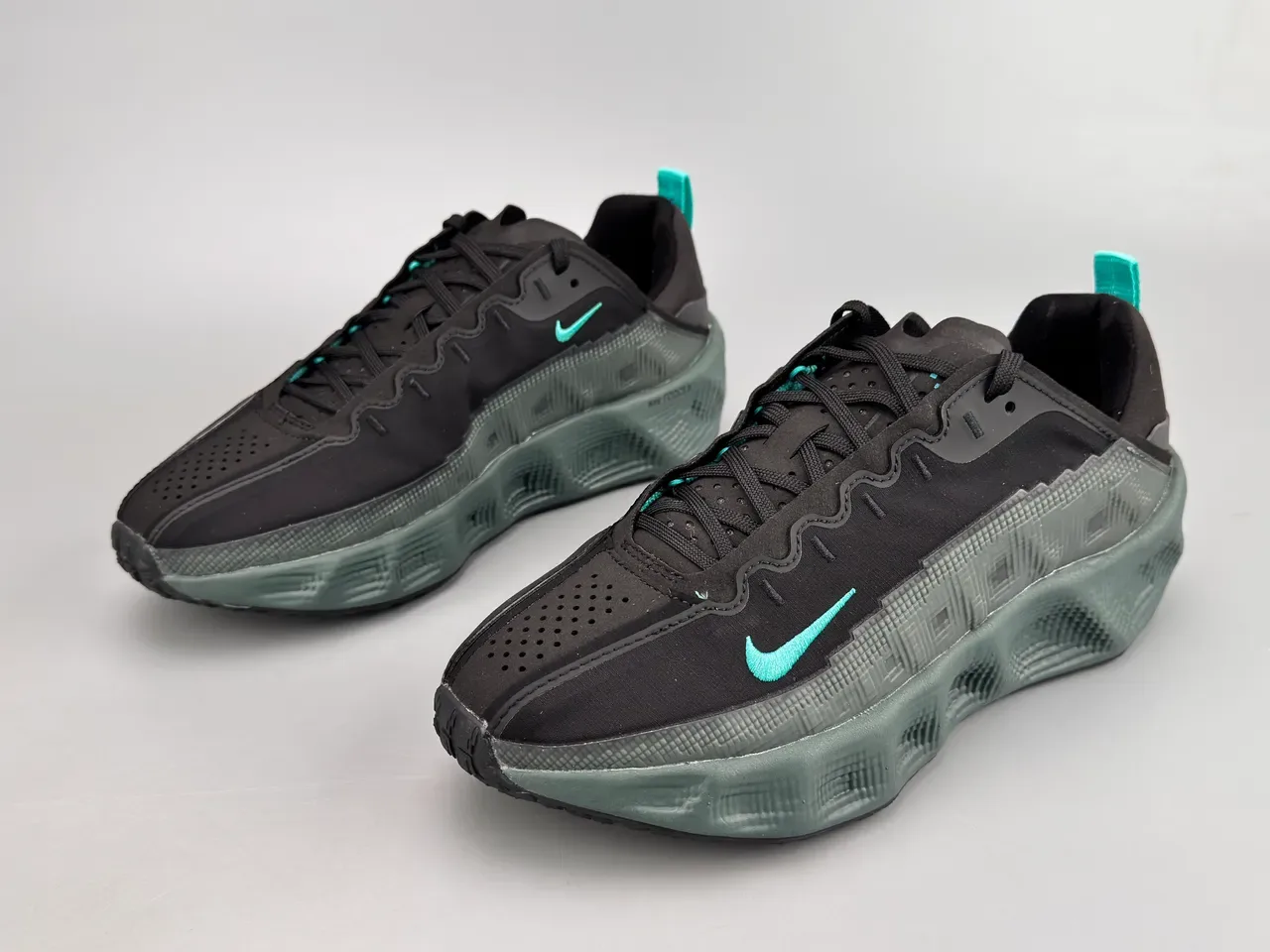 Nike Black and Teal Pixel Midsole Lifestyle Sneaker 9