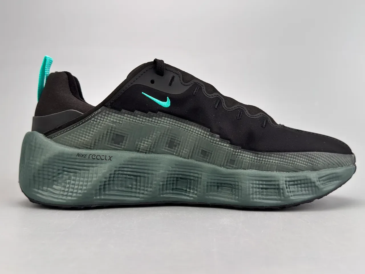 Nike Black and Teal Pixel Midsole Lifestyle Sneaker 10