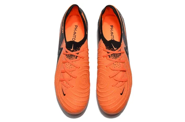 Nike Chaussures de football noir orange avec empeigne tricoté et lacets asymétriques pour terrain ferme 2