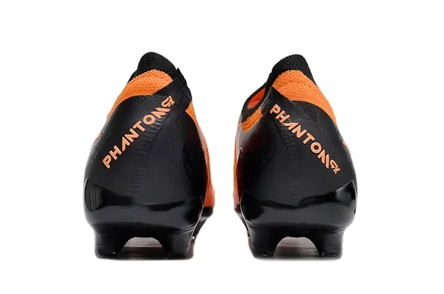 Nike Chaussures de football noir orange avec empeigne tricoté et lacets asymétriques pour terrain ferme 4