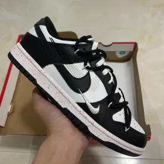 Tênis Nike Dunk Low preto branco moteado lifestyle