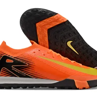Nike Sapatos de futebol turf com gola de ajuste dinâmico cor laranja e preto low-cut