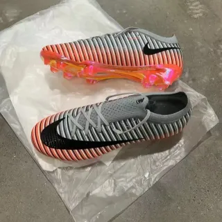 Nike حذاء كرة القدم برتقالي رمادي مخطط Flyknit upper كم ديناميكي فيت أرض طبيعية
