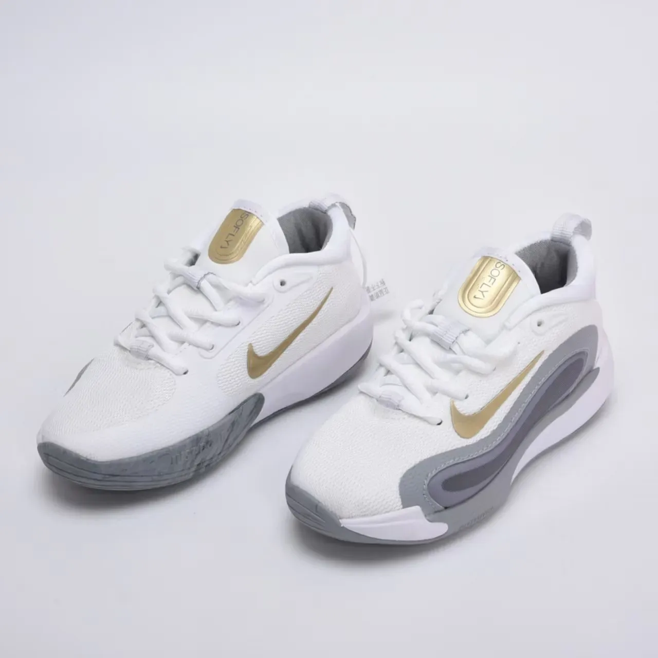 Nike White and Gold Kids Performance Sneakers 23