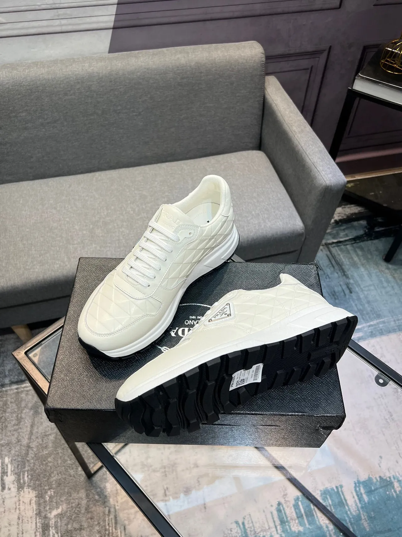 Prada Cloudbust Beige Black Quilted Diamond-Stitch Leather Triangular Metal Logo Plaque Lifestyle Sneakers 4
