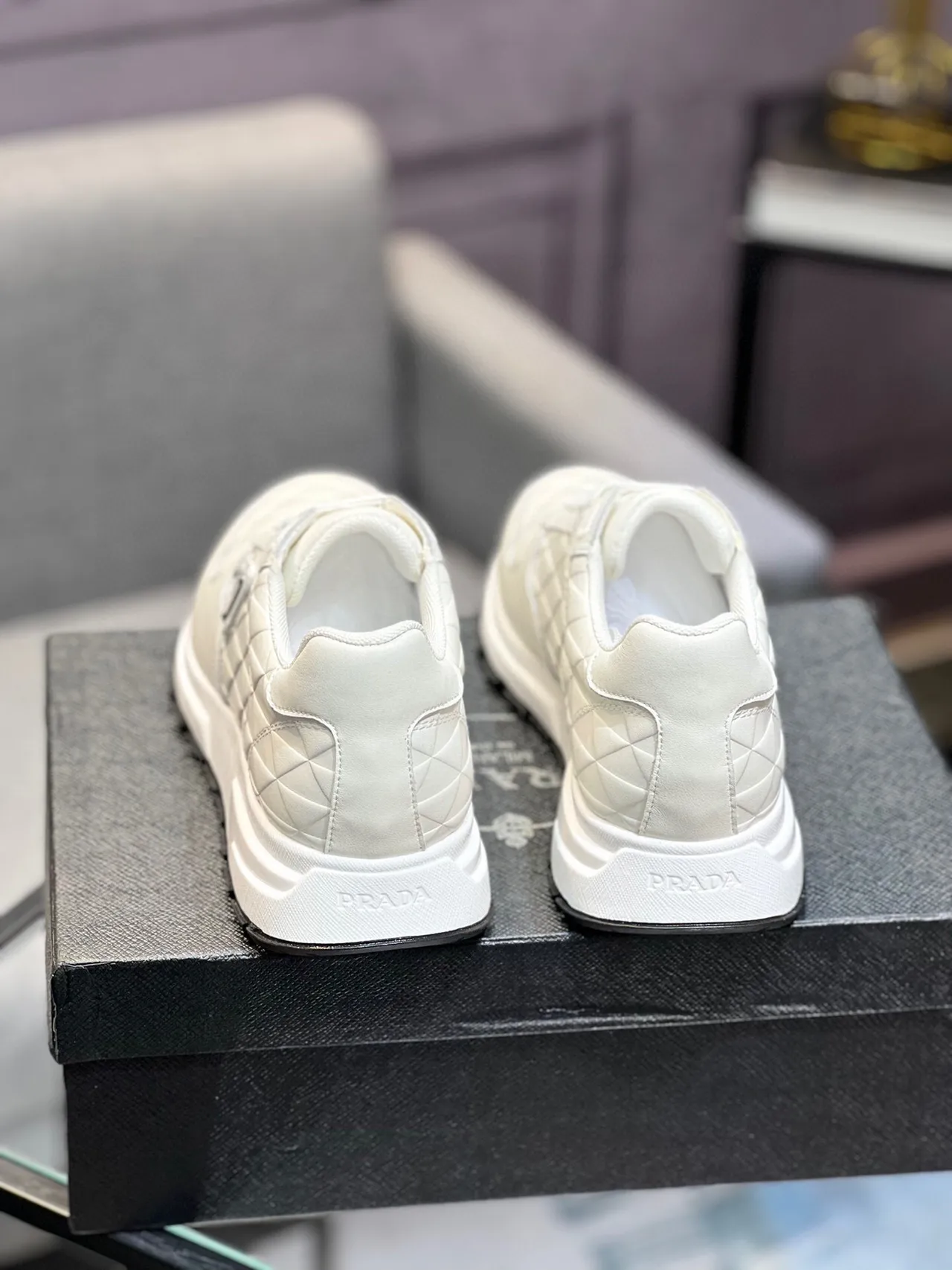 Prada Cloudbust Beige Black Quilted Diamond-Stitch Leather Triangular Metal Logo Plaque Lifestyle Sneakers 8