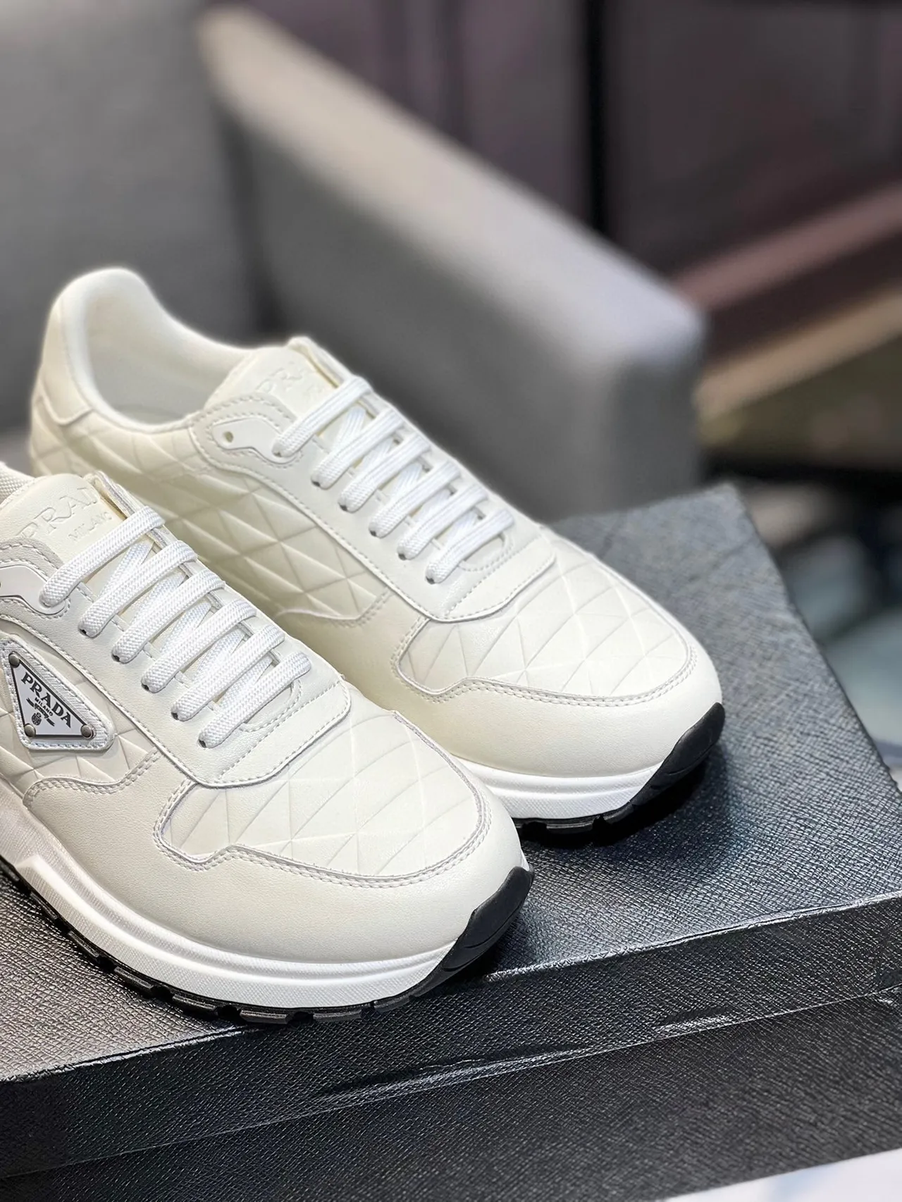 Prada Cloudbust Beige Black Quilted Diamond-Stitch Leather Triangular Metal Logo Plaque Lifestyle Sneakers 9