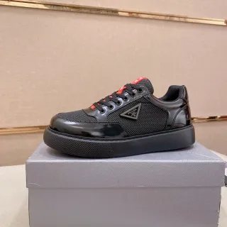 Prada Cloudbust काले पेटेंट और मेश लाइफस्टाइल स्नीकर