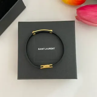 Saint Laurent سوار أسود ذهبي حزام مطاطي قفل H-Bar
