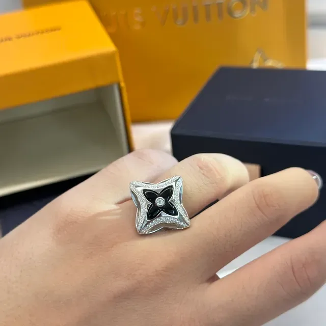 Tiffany & Co. Silver Blue Openwork Star Motif Polished Metal Ring 4