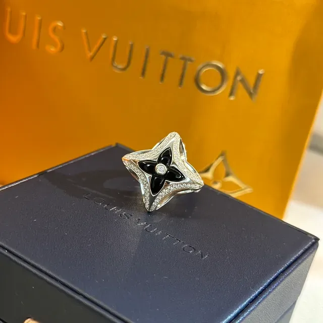 Tiffany & Co. Silver Blue Openwork Star Motif Polished Metal Ring 6