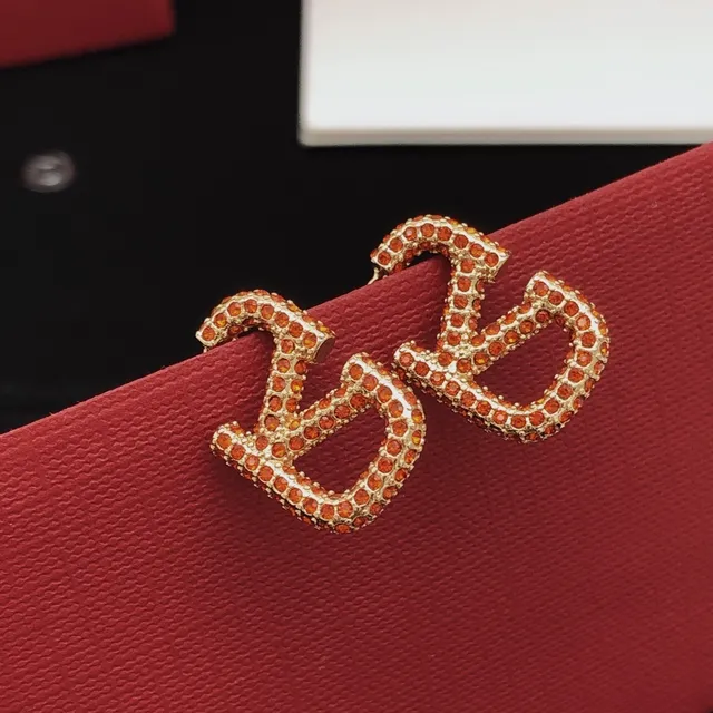 Valentino VLogo Pavé Cristal Orange Or en ton Boucles d'oreilles à clous 5