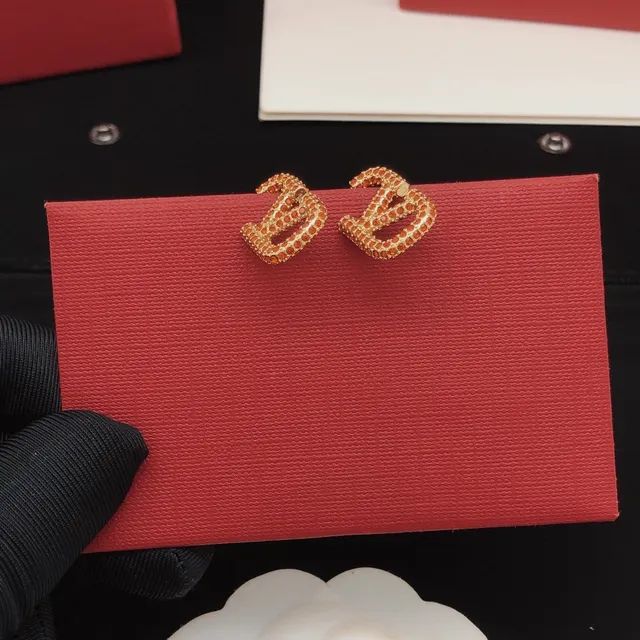 Valentino VLogo Pavé Cristal Orange Or en ton Boucles d'oreilles à clous 6