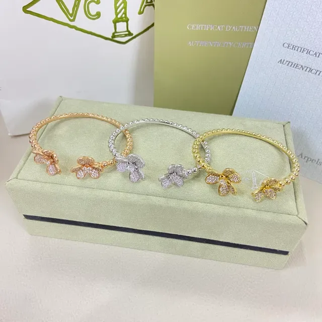 Van Cleef & Arpels Alhambra Flower Pavé-Set Open Rings 2