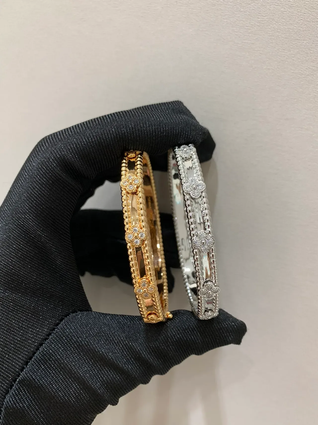 Van Cleef & Arpels Alhambra Pavé Gold and Silver Bangle Bracelets 2