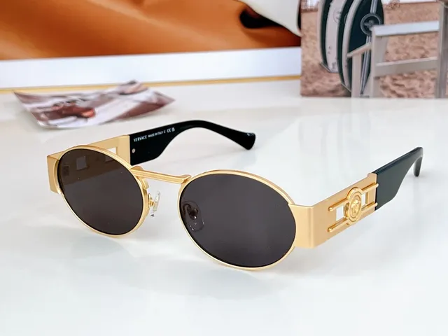 Versace Odissea Lunettes de soleil avec monture métallique et lentille ovale dorée marron 7