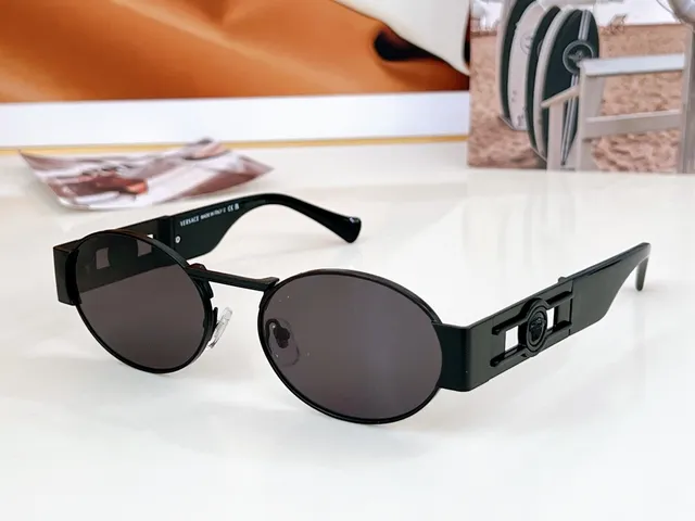 Versace Odissea Lunettes de soleil avec monture métallique et lentille ovale dorée marron 9