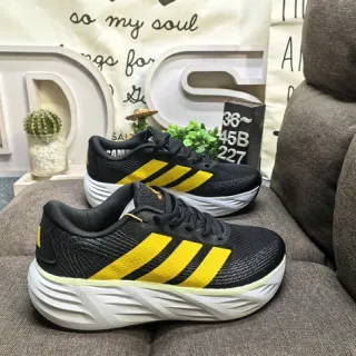 Adidas Black and Yellow Three-Stripe Knit Sneakers