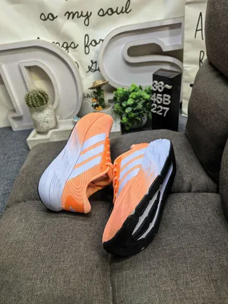 Adidas Black and Yellow Three-Stripe Knit Sneakers 16
