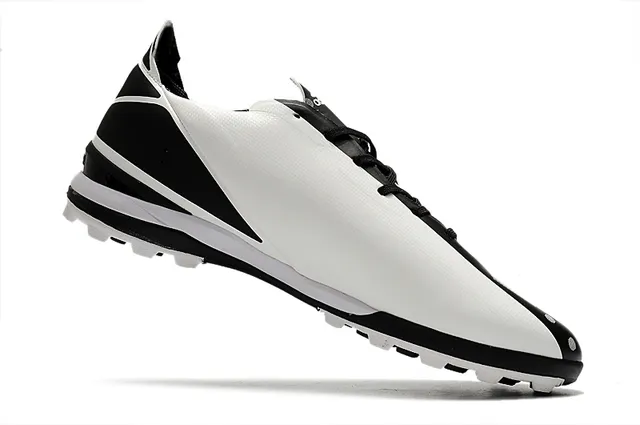 Adidas Chaussures de football orange et noir, upper synthétique, lacets asymétriques, low-cut pour gazon artificiel 2
