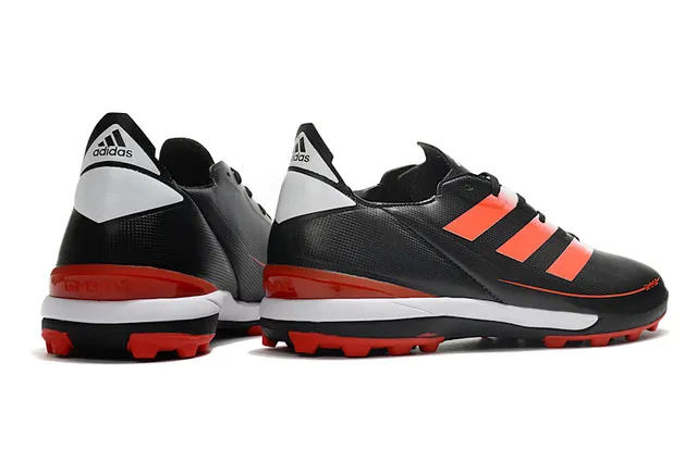 Adidas Chaussures de football orange et noir, upper synthétique, lacets asymétriques, low-cut pour gazon artificiel 19