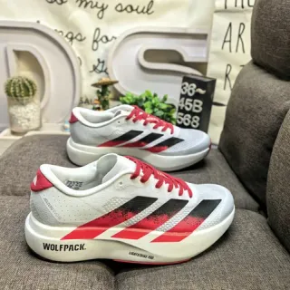 Adidas Chaussures de course blanches et rouges légères avec mesh upper design gradient à trois rayures