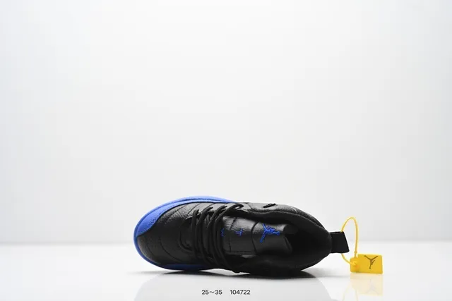 Zapatillas de baloncesto para niños Air Jordan 12 negro y naranja 7