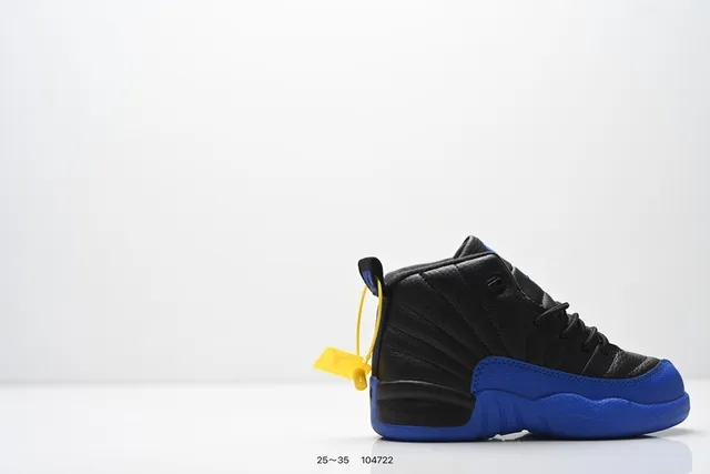 Zapatillas de baloncesto para niños Air Jordan 12 negro y naranja 9