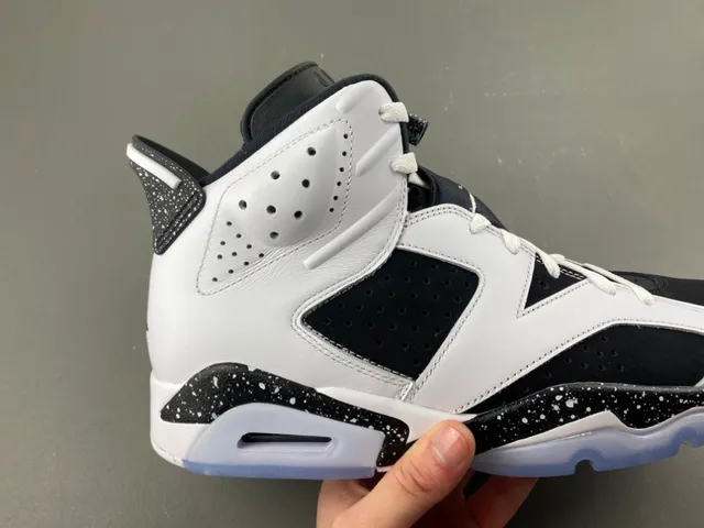 Tênis de basquete Air Jordan 6 com entressola salpicada em branco e preto 3