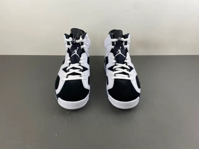 Tênis de basquete Air Jordan 6 com entressola salpicada em branco e preto 11