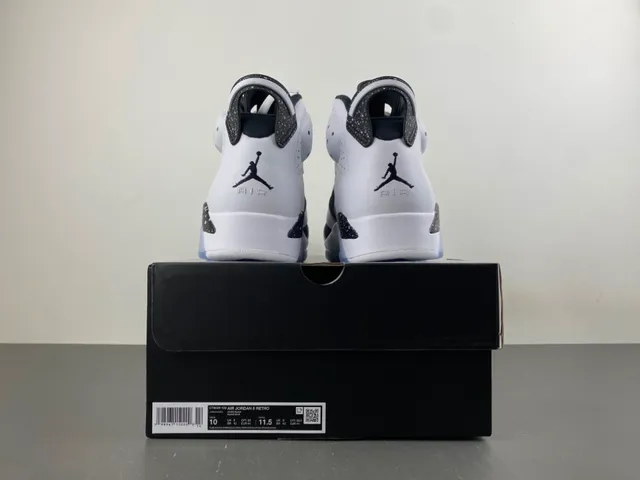 Tênis de basquete Air Jordan 6 com entressola salpicada em branco e preto 17