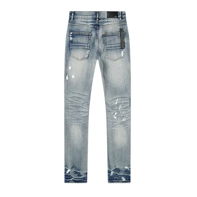 Amiri Distressed Logo-Print Light Blue Paint-Splatter Slim-Fit Jeans 3